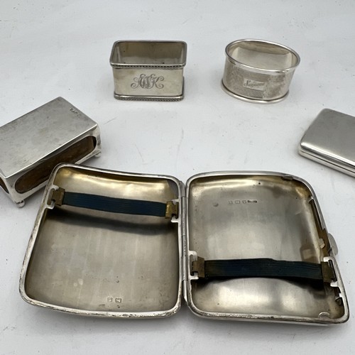 766 - Silver to include machine turned cigarette case, Birmingham 1918, Cohen & Charles, Matchbox holder, ... 