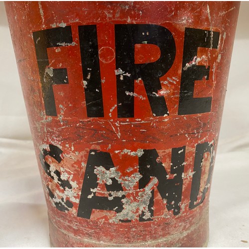 967 - A red metal Fire/Sand bucket from Kingsford Products Ltd 32cm to rim, a cannon ball and two cast iro... 