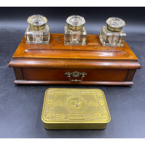 972 - A mahogany inkstand with drawer and three glass bottles with brass hinges etched to top, Copy G, Red... 