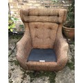 Parker Knoll brown swivel armchair with button back, 96cm floor to top 32cm floor to top of seat.