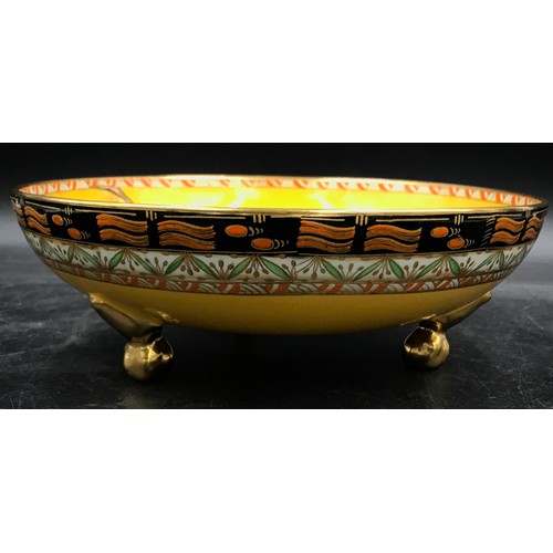 150 - Carlton Ware fruit bowl on three gilt raised feet with unusual Dragon and Traveller pattern in colou... 