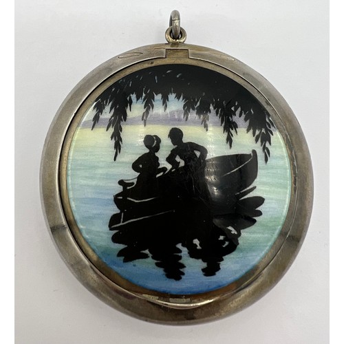 773 - A silver and enamel compact decorated in guilloche  enamel to rear and couple in boat to the front. ... 