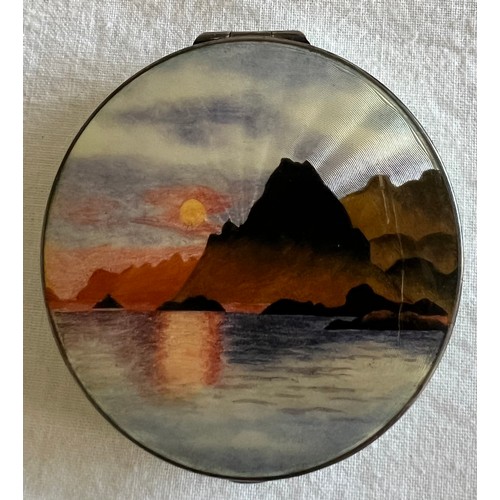 774 - A Norwegian silver and enamel compact by Kristen Hestenes depicting mountains and sea, marked .925 K... 