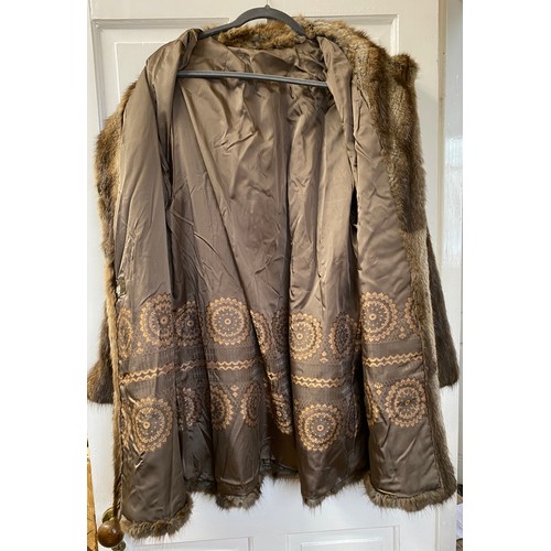 882 - Three vintage fur coats to include a short Coney jacket (s14), and two other jackets/coats of unknow... 