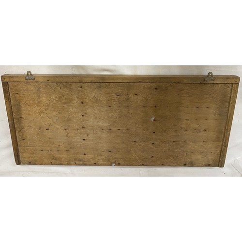 971 - A Wooden tray compartmentalised to take Printers' lettering 83cm x 37cm.