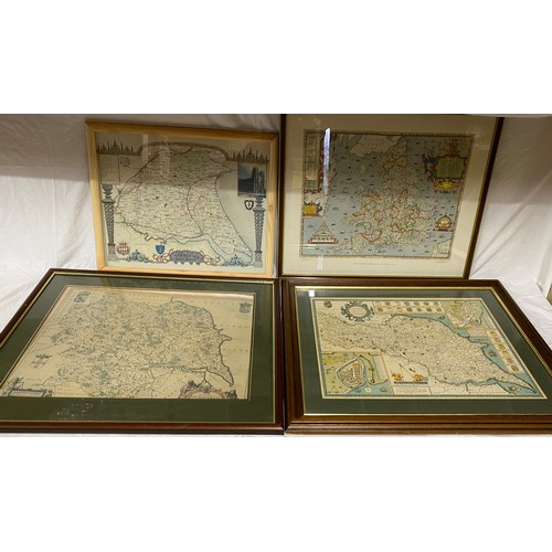 933 - A collection of framed reproduction maps to include The Ridings of Yorkshire, Anglia, Birds Eye View... 