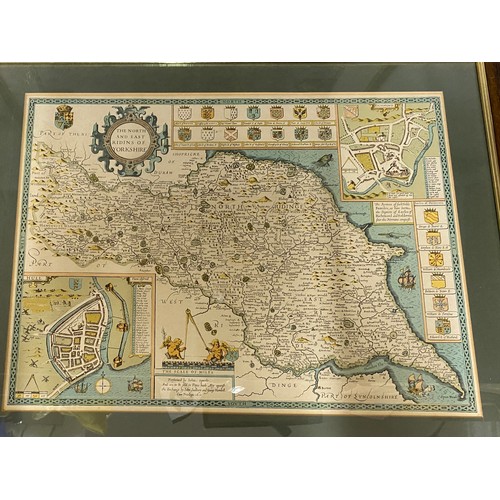 933 - A collection of framed reproduction maps to include The Ridings of Yorkshire, Anglia, Birds Eye View... 