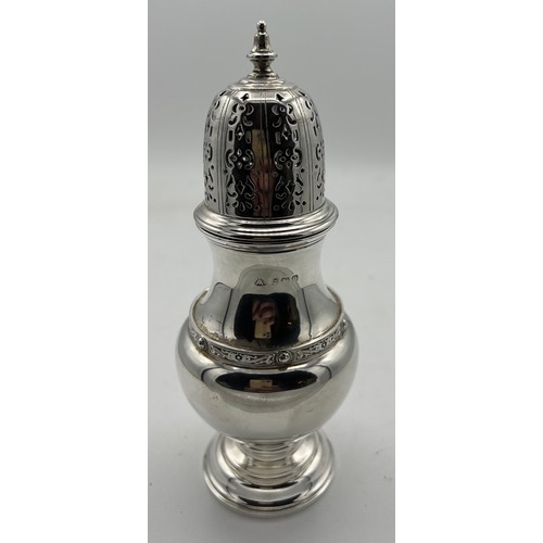 759 - A George VI silver sugar shaker Birmingham 1938, maker Adie Bros Ltd. Height 18cm. Weight 148gm.