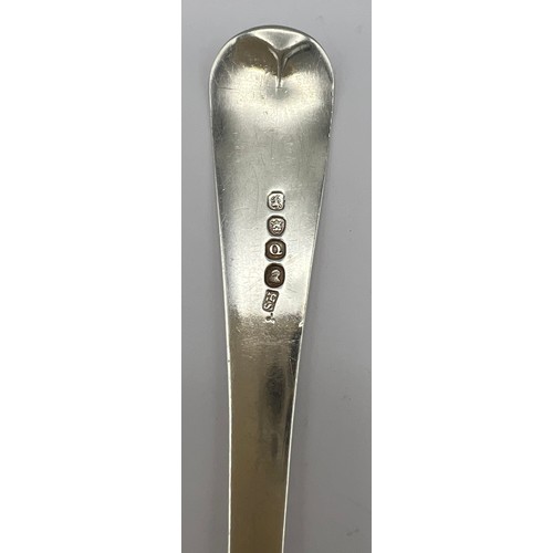 760 - George III silver spoon London 1811, maker Solomon Hougham. Length 22cm, weight 65gm.