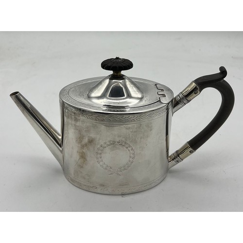 761 - A Victorian silver bachelor's teapot with ebony handle and knop. London 1871, maker Henry Holland. H... 