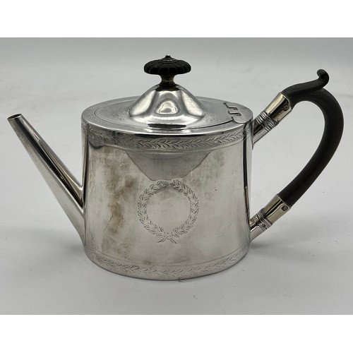 761 - A Victorian silver bachelor's teapot with ebony handle and knop. London 1871, maker Henry Holland. H... 