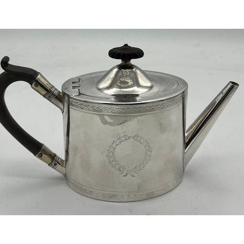 761 - A Victorian silver bachelor's teapot with ebony handle and knop. London 1871, maker Henry Holland. H... 