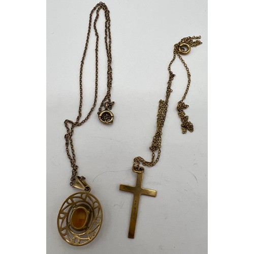 476 - A 9 carat gold pendant on chain together with a 9 carat gold crucifix on a broken chain. Total weigh... 