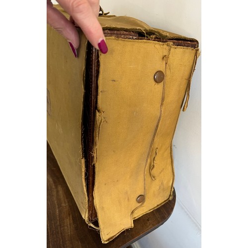 975 - A superb quality early 20thC crocodile fully fitted travelling dressing case. This comes with the or... 