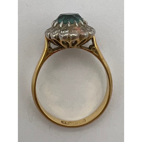 480 - An 18 carat gold cluster ring, the central blue stone surrounded by diamonds. Size M/N, weight 3.7gm... 