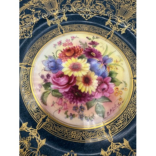 157 - A Royal Worcester cabinet plate decorated by E. Phillips. 23.5cm d.