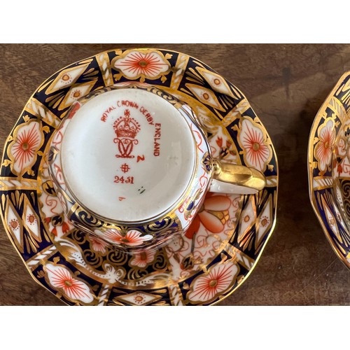 160 - A Royal Crown Derby coffee service comprising six cups and saucers. No. 2451