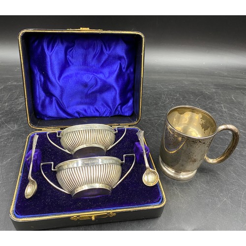 778 - A pair of Silver salts hallmarked Birmingham possibly 1887 B.H.A. and two spoons hallmarked Birmingh... 