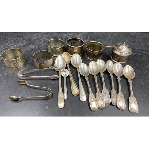 779 - A collection of silver items to include a matching set of six teaspoons hallmarked London 1896 Wakel... 