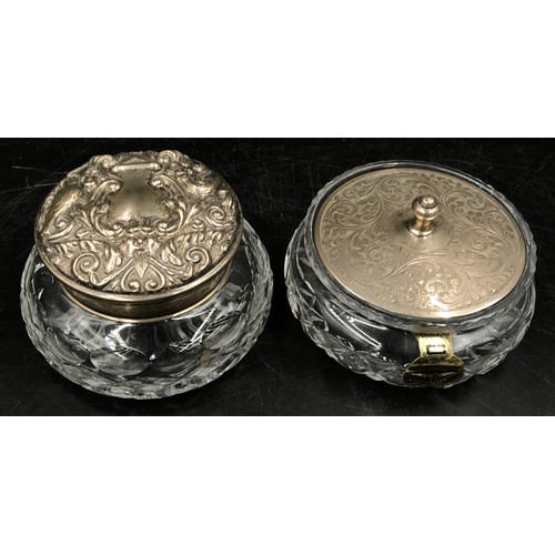 731 - Two silver topped powder bowls with mirrors to interior of tops, silver mounted glass perfume atomis... 