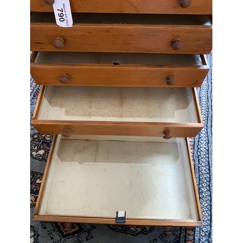 790 - A six drawer pine collectors cabinet with glass tops to drawers. 42 cm h x 22cm d x 38cm w. Label to... 