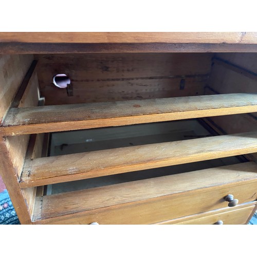 790 - A six drawer pine collectors cabinet with glass tops to drawers. 42 cm h x 22cm d x 38cm w. Label to... 