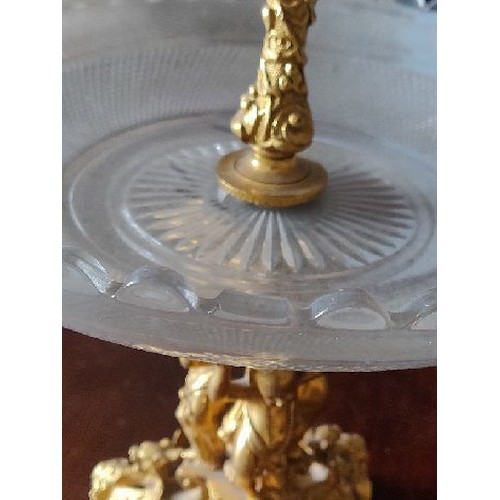 1020 - A 19thC ormolu and glass three tier tazza. 55cm h.