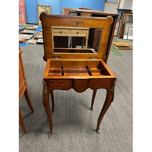 70 - A 19thC parquetry ladies dressing table with ormolu mounts made by and stamped Lamb of Manchester. 6... 