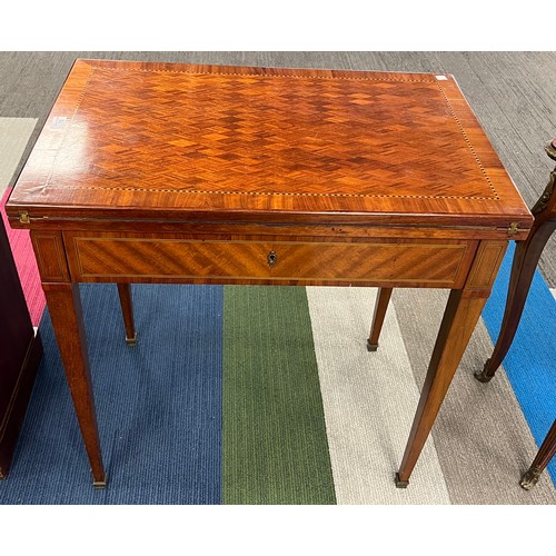 77 - A 19thC French metamorphic writing/card table in mahogany with parquetry top. 74cm w x 48cm d x 77cm... 