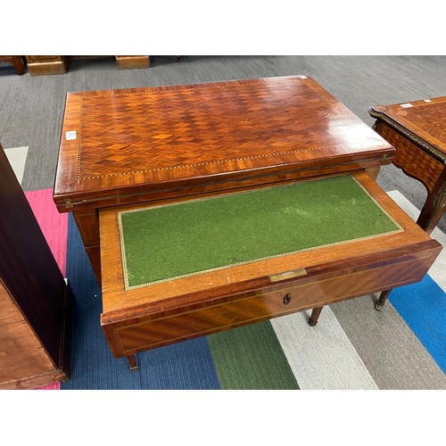 77 - A 19thC French metamorphic writing/card table in mahogany with parquetry top. 74cm w x 48cm d x 77cm... 