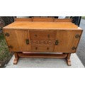 An Art Deco Golden Oak sideboard, table and chairs by TT Cass & Sons, Hull. Sideboard 153 w x 52 d x... 
