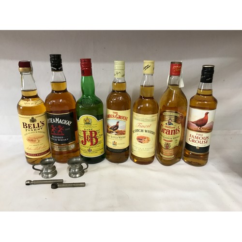 699 - Assortment of whisky comprising 5 x 70cl bottles, Bell's Grant's, The Famous Grouse x 2 , Morrisons,... 