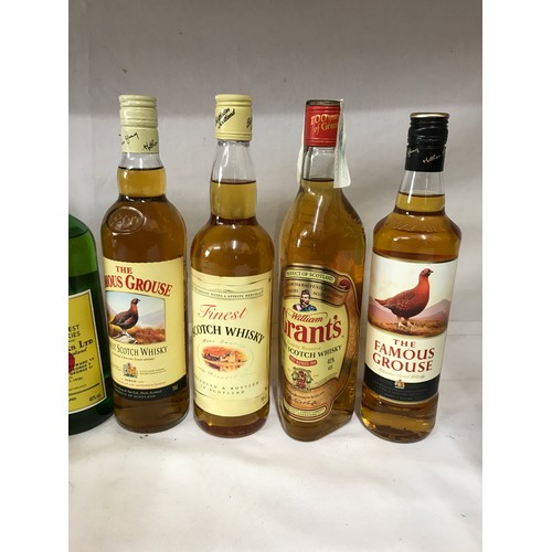 699 - Assortment of whisky comprising 5 x 70cl bottles, Bell's Grant's, The Famous Grouse x 2 , Morrisons,... 