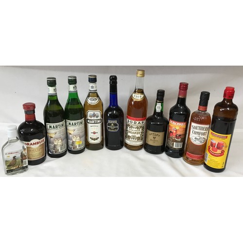 700 - Eleven assorted bottles of spirits to include Southern Comfort, Martini (3), Drambuie, Dubonnet, Por... 