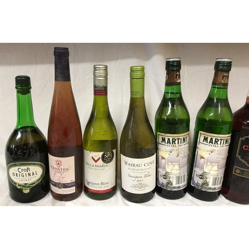 704 - A mixture of alcohol to include 4 bottles of white wine, 1 rose, Croft Original sherry, 2 Martini ex... 