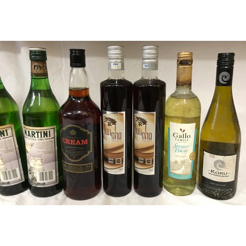 704 - A mixture of alcohol to include 4 bottles of white wine, 1 rose, Croft Original sherry, 2 Martini ex... 