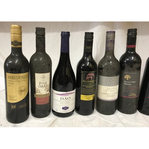 706 - A selection of 11 bottles of red wine to include Namaqua, Five Oaks, Bordeaux Superier, Dao, Oxford ... 