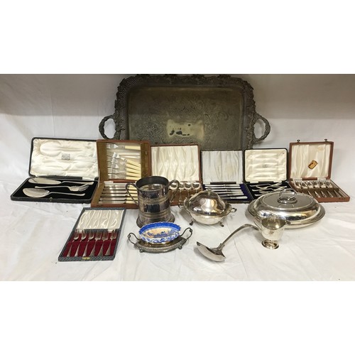 767 - A collection of silver plate items to include a large ornate serving tray on raised feet 74.5 x 46cm... 