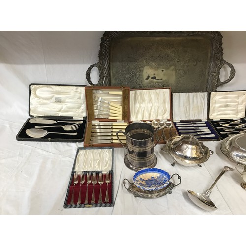 767 - A collection of silver plate items to include a large ornate serving tray on raised feet 74.5 x 46cm... 