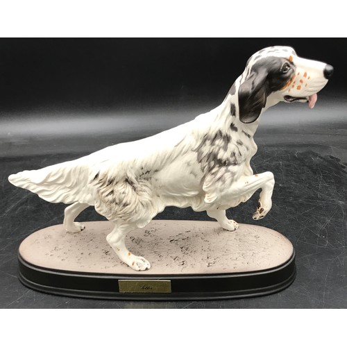 198 - Two Beswick matt pottery figures of dogs one a basset hound, on wooden plinth 15.5h the other a Sett... 