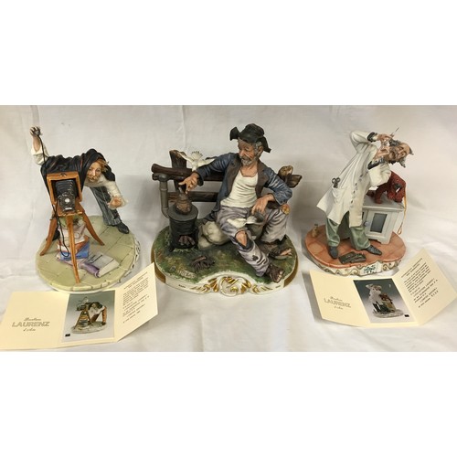 203 - Three Capodimonte figures to include The Photographer No.533/1000, Tramp feeding the birds and Vet N... 