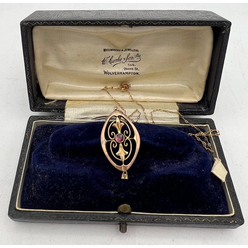 397 - An Edwardian 9 carat gold pendant on fine gold chain set with garnets. Total weight 1.6gm together w... 