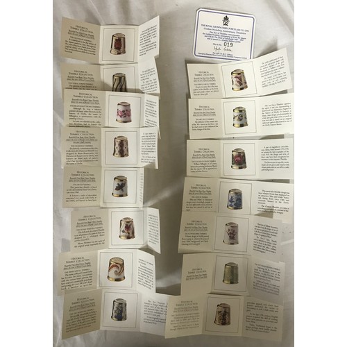 213 - A collection of ceramic thimbles to include 15x Royal Crown Derby all with certificates, a pair of l... 