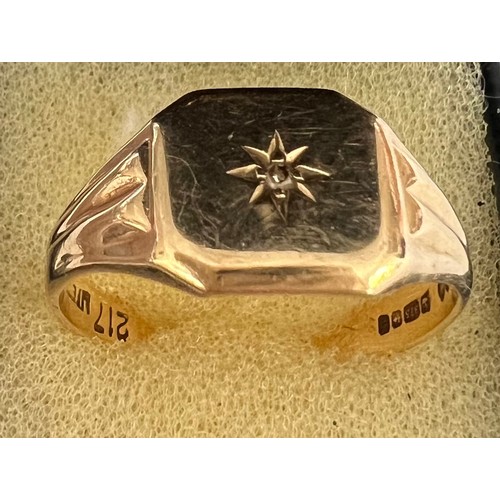 405 - A 9 carat gold signet ring set with single diamond. Size V, weight 4gm.