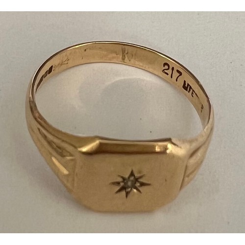 405 - A 9 carat gold signet ring set with single diamond. Size V, weight 4gm.