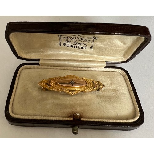 410 - A Victorian 9 carat gold diamond set bar brooch, Chester 1899. In a fitted contemporary box.