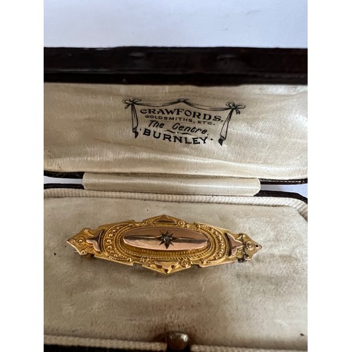 410 - A Victorian 9 carat gold diamond set bar brooch, Chester 1899. In a fitted contemporary box.