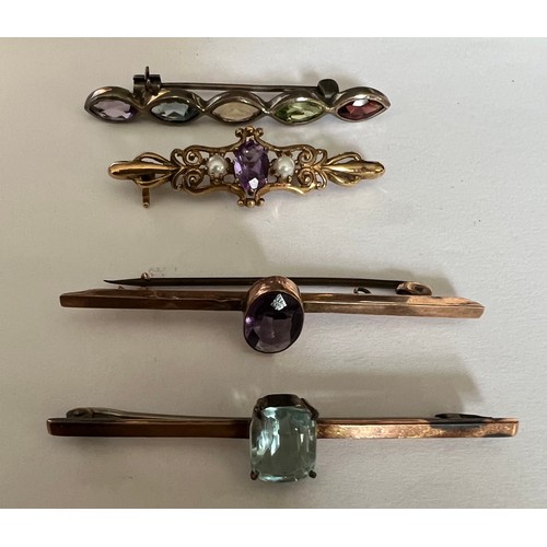 412 - Four various gem set bar brooches to include two 9ct, one silver and one in yellow metal.