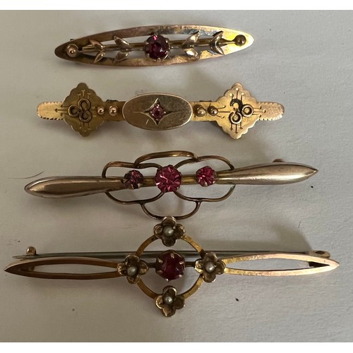 414 - Four various Edwardian bar brooches set with pink stones. Two marked 9 carat gold and two unmarked y... 