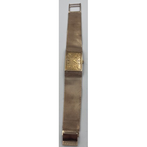 499 - A 9ct gold Bueche Girod bracelet watch, rectangular shape, champagne dial. Case: 21mm. 18.5cm l. 50.... 